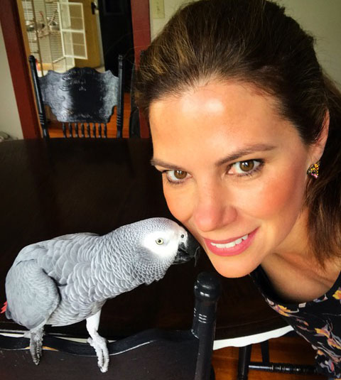 Charissa Beavers and her African Grey parrot Amos